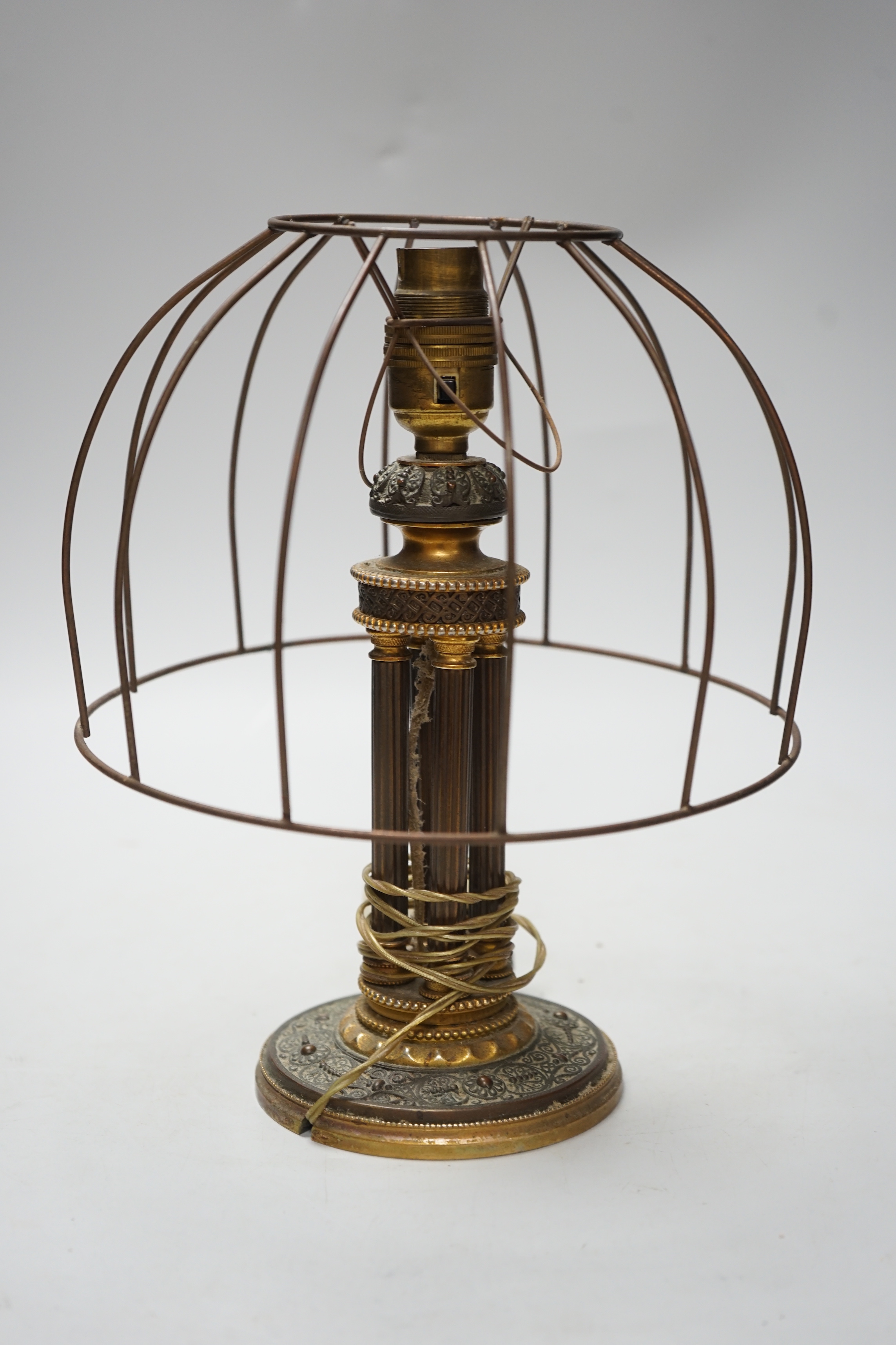 An early 20th century French columnar table lamp, 25cm total height